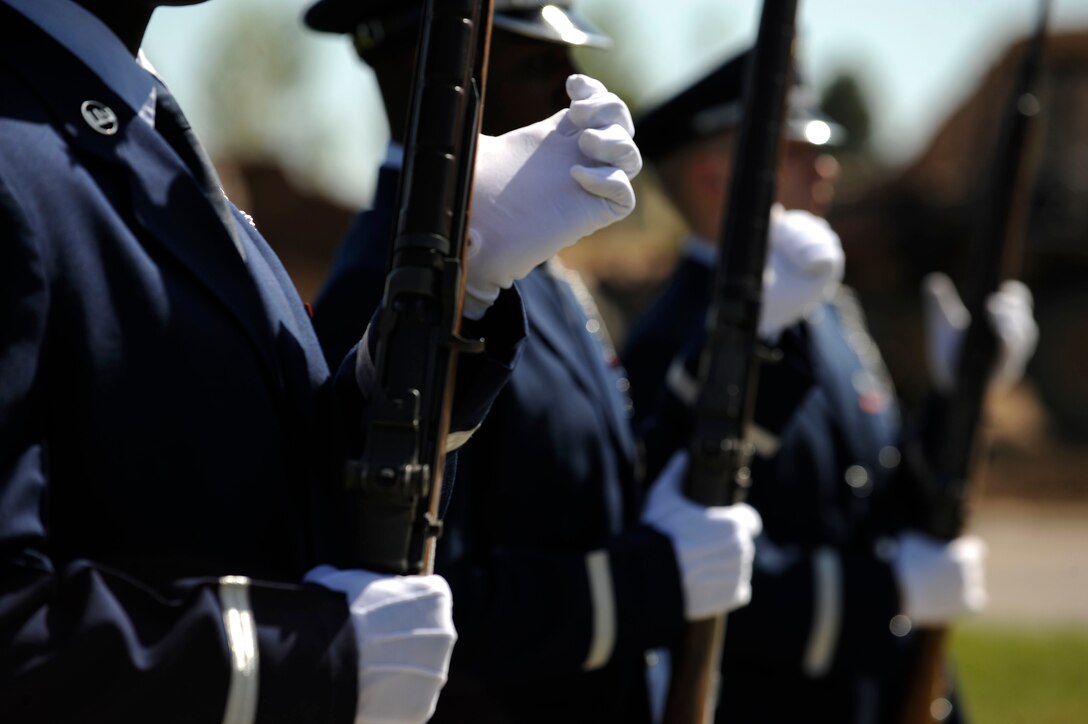 Airmen from Ellsworth Air Force Base Honor Guard prepare to conduct a 21-gun salute for a funeral service held at Black Hills National Cemetery in Rapid City, S.D., Sept. 15. The service was held for a World War ll veteran. (U.S. Air Force photo by Airman 1st Class Corey Hook)