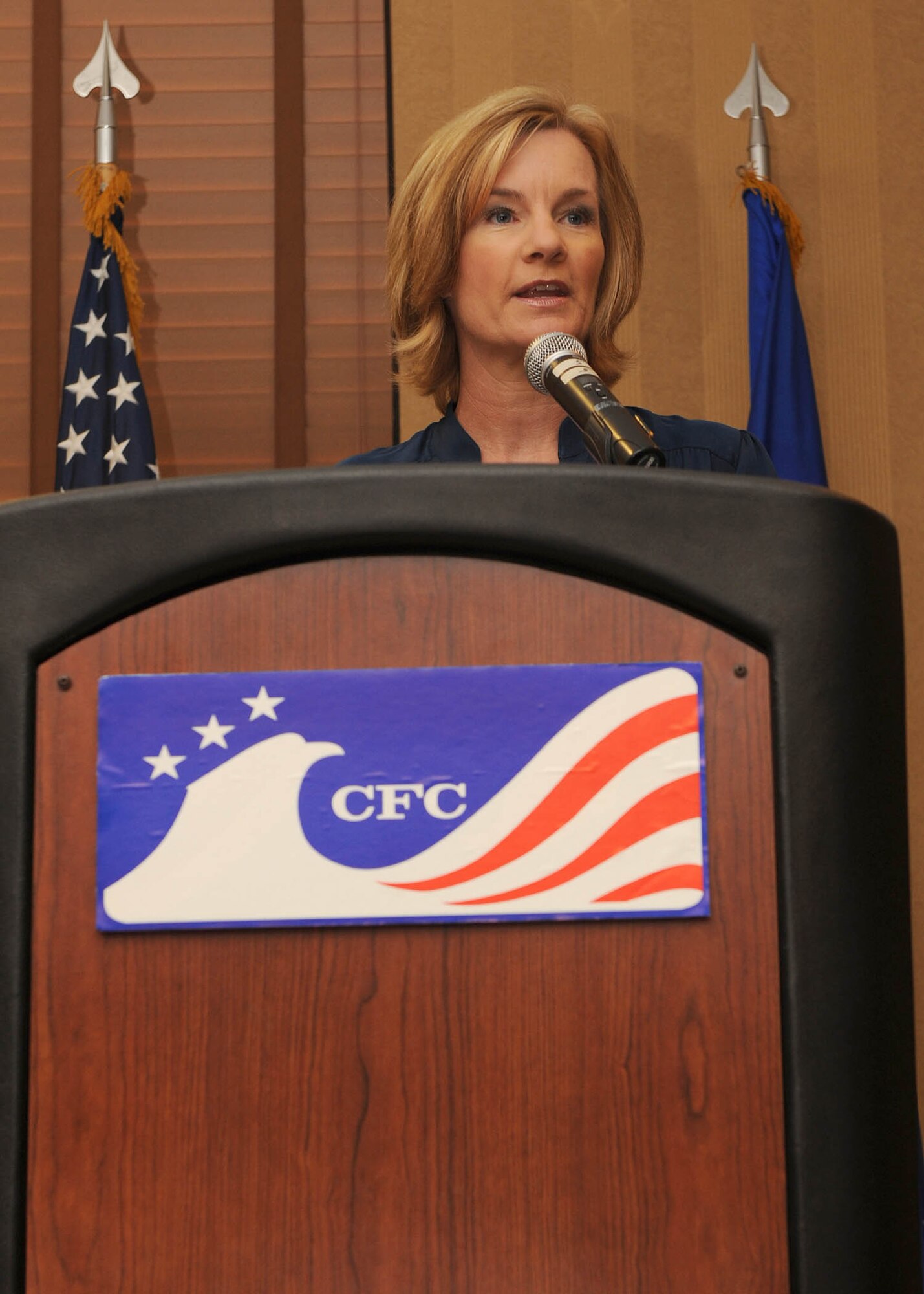 Mindy Blake, KOLD-TV News anchor, speaks to Airmen and the Tucson community at the Combined Federal Campaign breakfast here Sept. 16. The breakfast was the kick off of the CFC program for this year. The CFC is the largest single charitable campaign in the world. There are 382 National and Local Agencies available to donate too. The theme of this year is “I Can… Now More Than Ever”. More than 300 personnel came out for the breakfast. (U.S. Air Force Photo by: Senior Airman Jacqueline Romero)