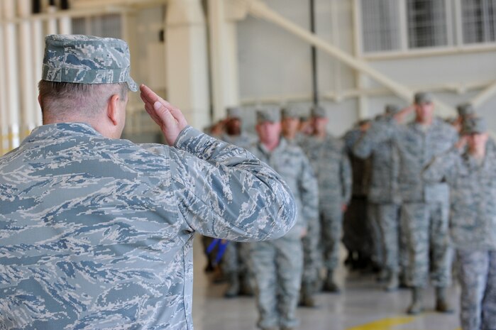 NELLIS AIR FORCE BASE Nev.,--  Maj. Shane Henderson, 757th Aircraft Maintenance Squadron commander, renders his first salute as the squadron's new commander at its reactivation ceremony at Nellis, Sept. 17. This is the second aircraft maintenance squadron established under the 57th Maintenance Group with the purpose of providing focused aircraft maintenance. (U.S. Air Force photo by Airman 1st Class Brett Clashman)
