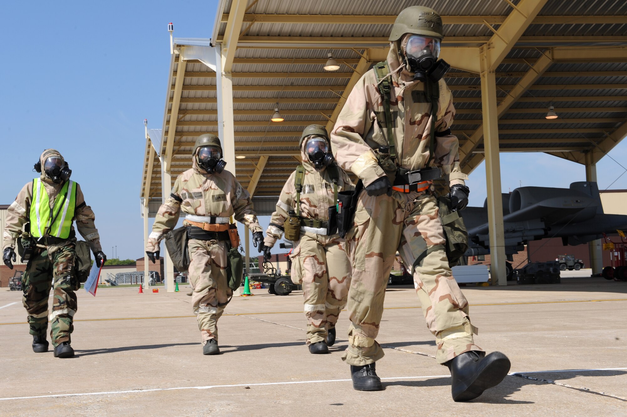 WHITEMAN AIR FORCE BASE, Mo. – Members of the 442nd Fighter Wing proceed to the nearest bunker to take cover during a simulated attack in the Phase II exercise, Sept. 16. Phase II exercise is an annual mobility exercise, which inspects all areas of 442nd operations. (U.S. Air Force photo/Senior Airman Cory Todd)