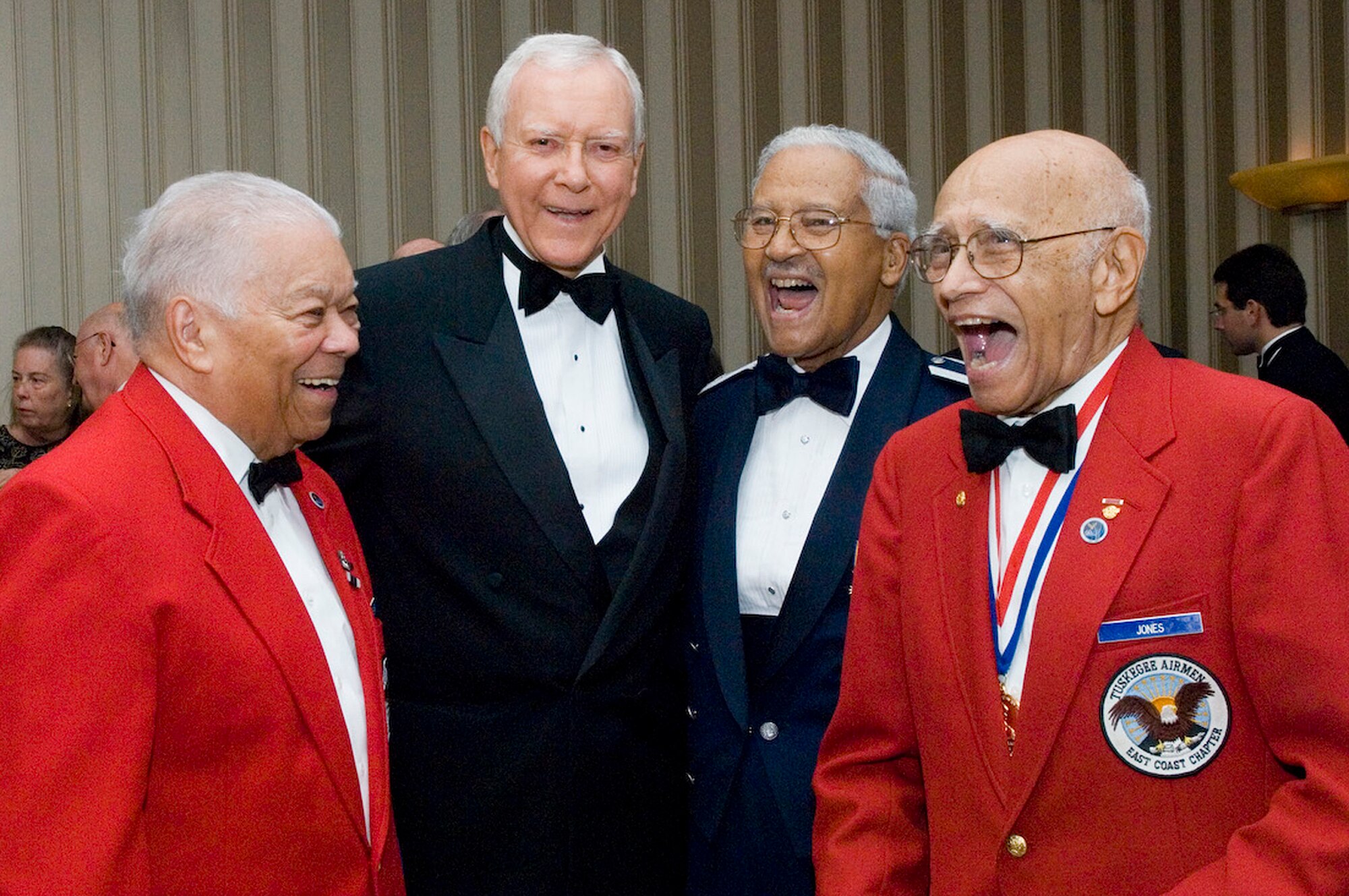 Sen. Orrin Hatch laughs with retired Lt. Col. Walter McCreary, retired Col. Charles McGee and retired Col. Elmer Jones at the Air Force anniversary dinner Sept. 16, 2009, at the Gaylord National Hotel and Convention Center in National Harbor, Md. Senator Hatch is the senator of Utah, and Colonels Jones, McGee and McCreary are members of the Tuskegee Airmen. Senator Hatch received the W. Stuart Symington Award and Tuskegee Airmen were presented a Lifetime Achievement Award. The dinner was the end of the 2009 Air Force Association Air & Space Conference and Technology Exposition. (U.S. Air Force photo/Staff Sgt. Desiree N. Palacios)