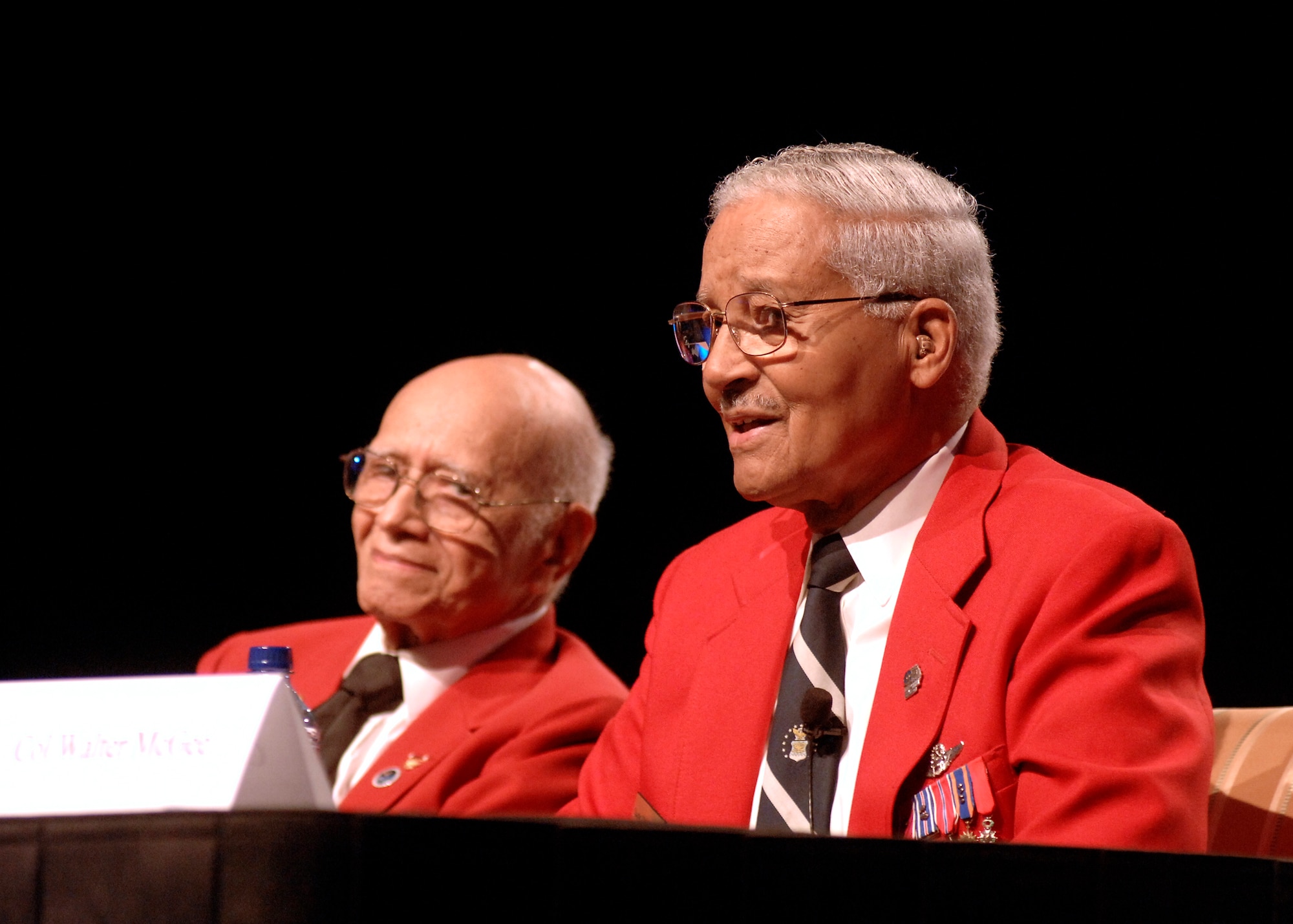 Retired Col. Elmer Jones and retired Col. Charles McGee address an audience during an open forum at the 2009 Air Force Association Air & Space Conference and Technology Exposition Sept. 15, 2009, at the National Harbor in Oxon Hill, Md. Colonels Jones and McGee are original Tuskegee Airmen, and were honored with lifetime achievement awards from Air Force Association officials. (U.S. Air Force photo/Andy Morataya) 