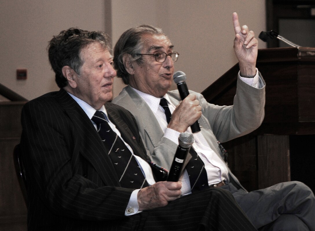 Retired Air Cmdr. Charles Clarke (left) and Andrew Wiseman, former prisoners of war, were two of the guest speakers at the POW/Missing in Action Remembrance Luncheon Sept. 16, 2009, at Royal Air Force Mildenhall, England. The former Royal Air Force airmen told their stories about being shot down over Germany during World War II and their lives in a POW camp. (U.S. Air Force photo/Senior Airman Thomas Trower) 