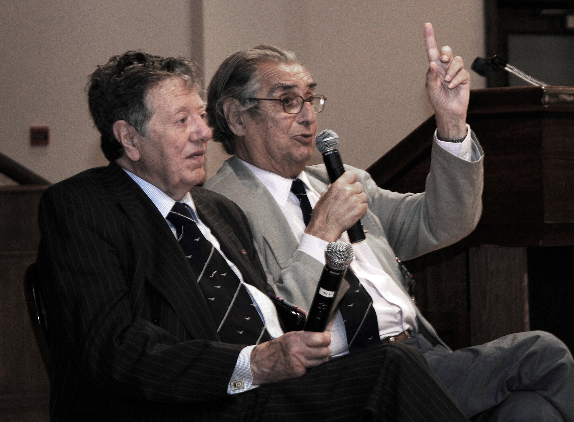 Retired Air Cmdr. Charles Clarke (left) and Andrew Wiseman, former prisoners of war, were two of the guest speakers at the POW/Missing in Action Remembrance Luncheon Sept. 16, 2009, at Royal Air Force Mildenhall, England. The former Royal Air Force airmen told their stories about being shot down over Germany during World War II and their lives in a POW camp. (U.S. Air Force photo/Senior Airman Thomas Trower) 