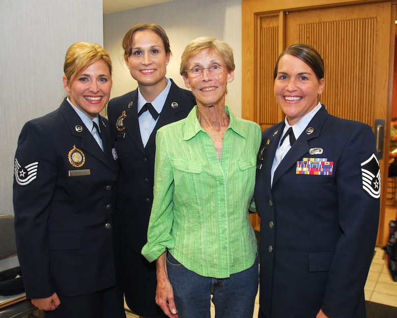 Technical Sgt. Nicole Crivello, left and Master Sgts. Patricia Gross and Angela Petri were honored by the City of Cudahy for potentially saving the life of Linda Provolo, center  September 15, 2009. The three airmen from the 128th Air Refueling Wing, Milwaukee where honored in a city  resolution citing an act of heroism for performing CPR and saving Linda Provolo who had collapsed and suffered a heart attack outside her home. (U.S. Air Forces photo by Staff Sgt. Nathan Wallin/Released)