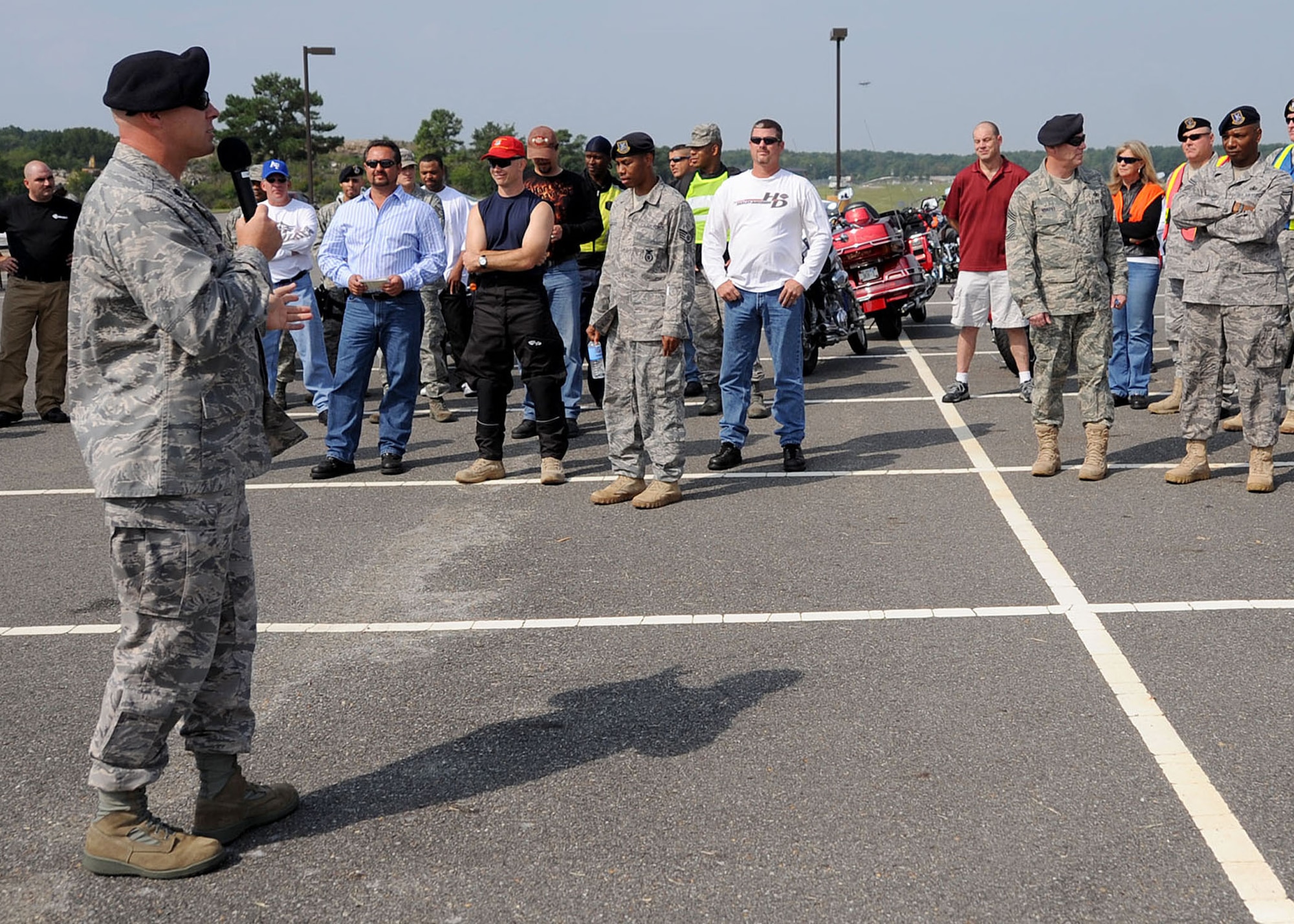LANGLEY AIR FORCE BASE, Va. -- Lt. Col. William Brooks, 1st Security Forces Squadron commander, gives a safety brief to riders before Langley's first Air Force Birthday Motorcycle Ride here Sept. 16. All proceeds from the ride were donated to Operation Warm Heart, a year-round program designed to assist Airmen and their families.  (U.S. Air Force photo/Airman Rebecca Montez)