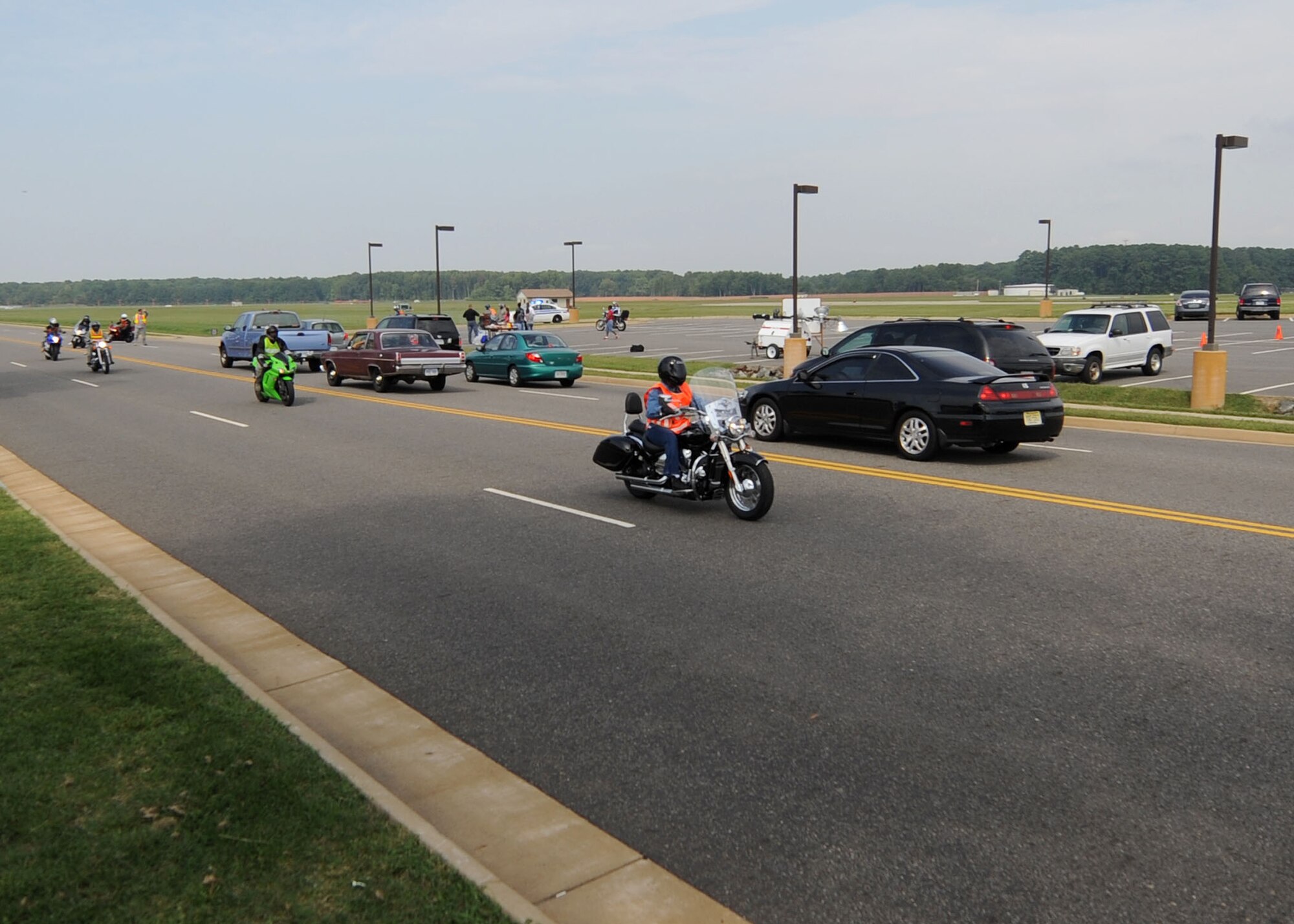 LANGLEY AIR FORCE BASE, Va. -- Riders depart on a road trip to Williamsburg as part of Langley's first annual Air Force Birthday Motorcycle Ride here Sept. 16. All proceeds from the ride were donated to Operation Warm Heart, a year-round program designed to assist Airmen and their families.  (U.S. Air Force photo/Airman Rebecca Montez)