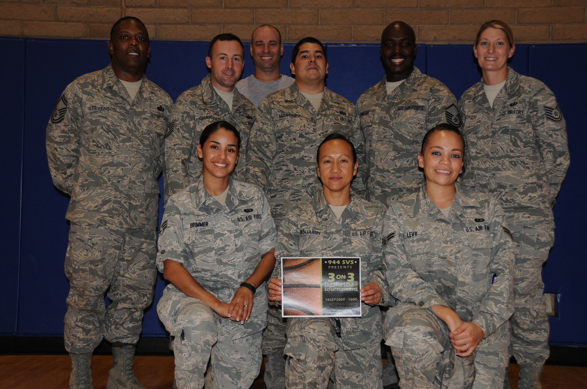The 944th Services Flight pose for a photo after a 3-on-3 basketball tournament. The flight put on the tournament for wing members during the mandatory home station annual tour to encourage fitness and camaraderie. (U.S. Air Force photo/Tech. Sgt. Susan Stout) 