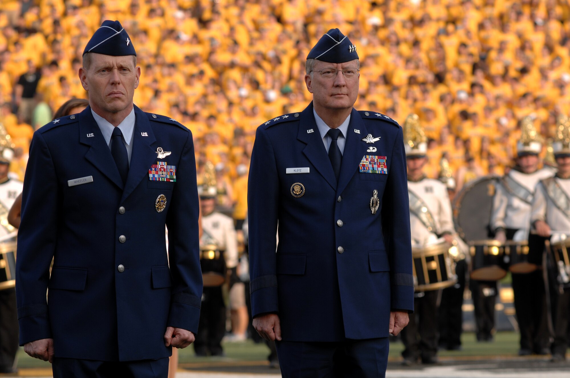 WHITEMAN AIR FORCE BASE, Mo - Lt. Gen. Frank Klotz, commander, Global Strike Command and Brig. Gen. Robert Wheeler, commander, 509th Bomb Wing, stand at attention before the singing of our National Anthem Saturday Sept. 12 at Faurot Field (Memorial Stadium).  The Mizzou home opener against Bowling Green was special in that it was Military Appreciation Day honoring all military both past and present.  