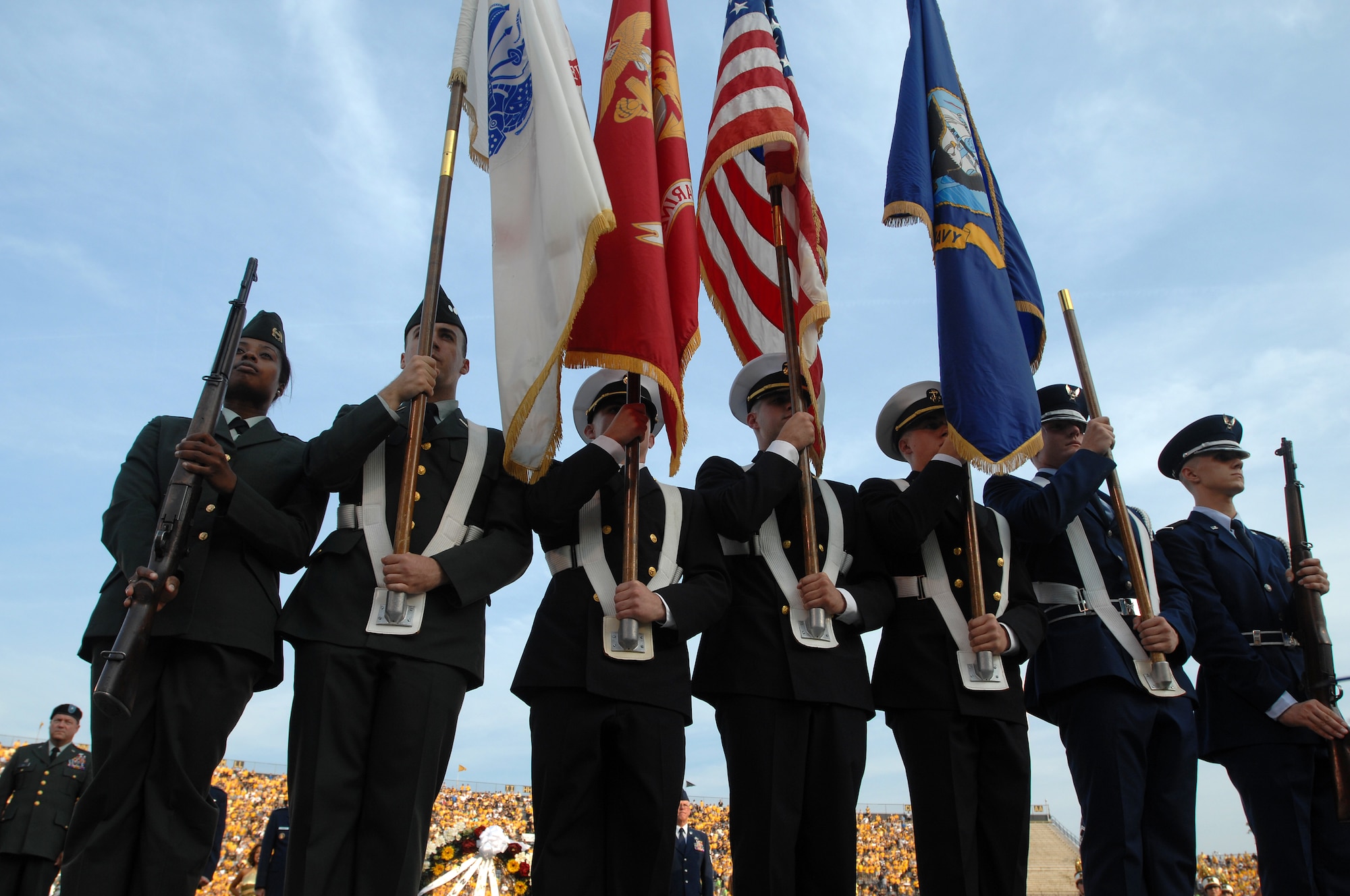 WHITEMAN AIR FORCE BASE, Mo- Military Appreciation Day was held at Faurot Field (Memorial Stadium) in Columbia, Mo. Sept. 12. ROTC Cadets presented the colors before kickoff at the Mizzou home opener against Bowling Green. More than 500 military members and their families were in attendance.  A tailgate party, courtesy of Mr. Joe Scallorns and his wife Fran, and a half time celebration were also dedicated to the United States military during this special event.(U.S. Photo/ Senior Airman Kenny Holston)