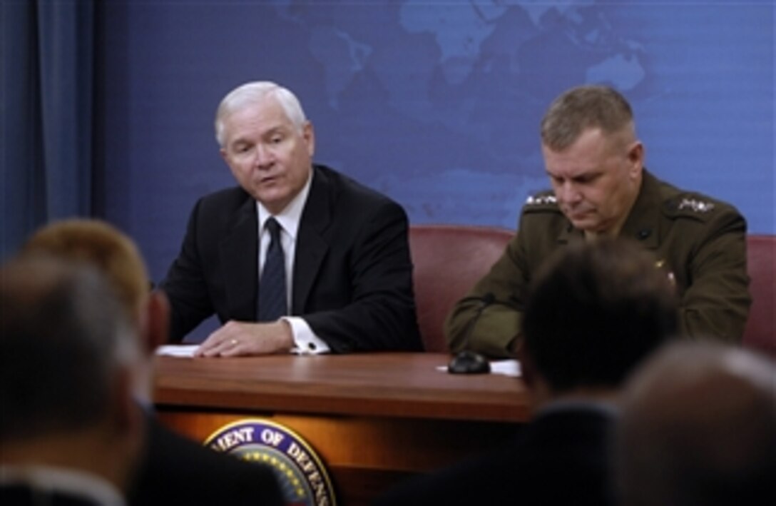 Secretary of Defense Robert M. Gates (left) and Vice Chairman of the Joint Chiefs of Staff Gen. James E. Cartwright answer questions from reporters during a press briefing in the Pentagon on Sept. 17, 2009.  