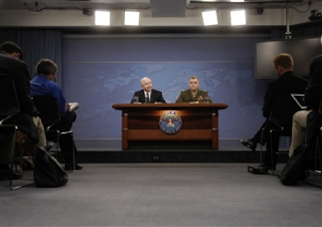 Secretary of Defense Robert M. Gates (left) and Vice Chairman of the Joint Chiefs of Staff Gen. James E. Cartwright answer questions from reporters during a press briefing in the Pentagon on Sept. 17, 2009.  