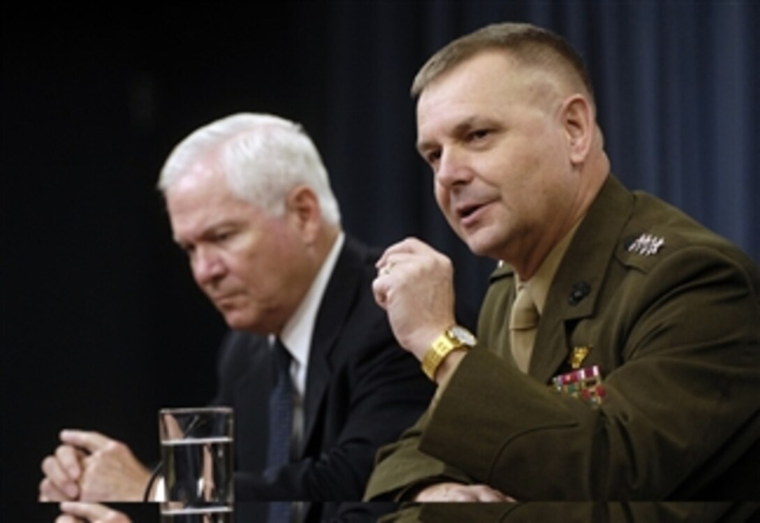 Vice Chairman of the Joint Chiefs of Staff Gen. James E. Cartwright (right) and Secretary of Defense Robert M. Gates answer questions from reporters during a press briefing in the Pentagon on Sept. 17, 2009.  