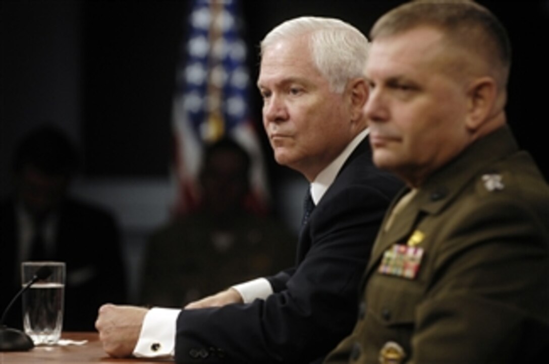 Secretary of Defense Robert M. Gates (left) and Vice Chairman of the Joint Chiefs of Staff Gen. James E. Cartwright answer questions from reporters during a press briefing in the Pentagon on Sept. 17, 2009.  
