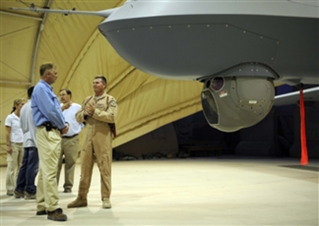 Deputy Secretary of Defense William J. Lynn III is given a tour of Predator and Reaper assets in theater by Lt. Col. Morgan Curry, U.S. Air Force, at Kandahar Air Field, Afghanistan, on Sept.10, 2009.  