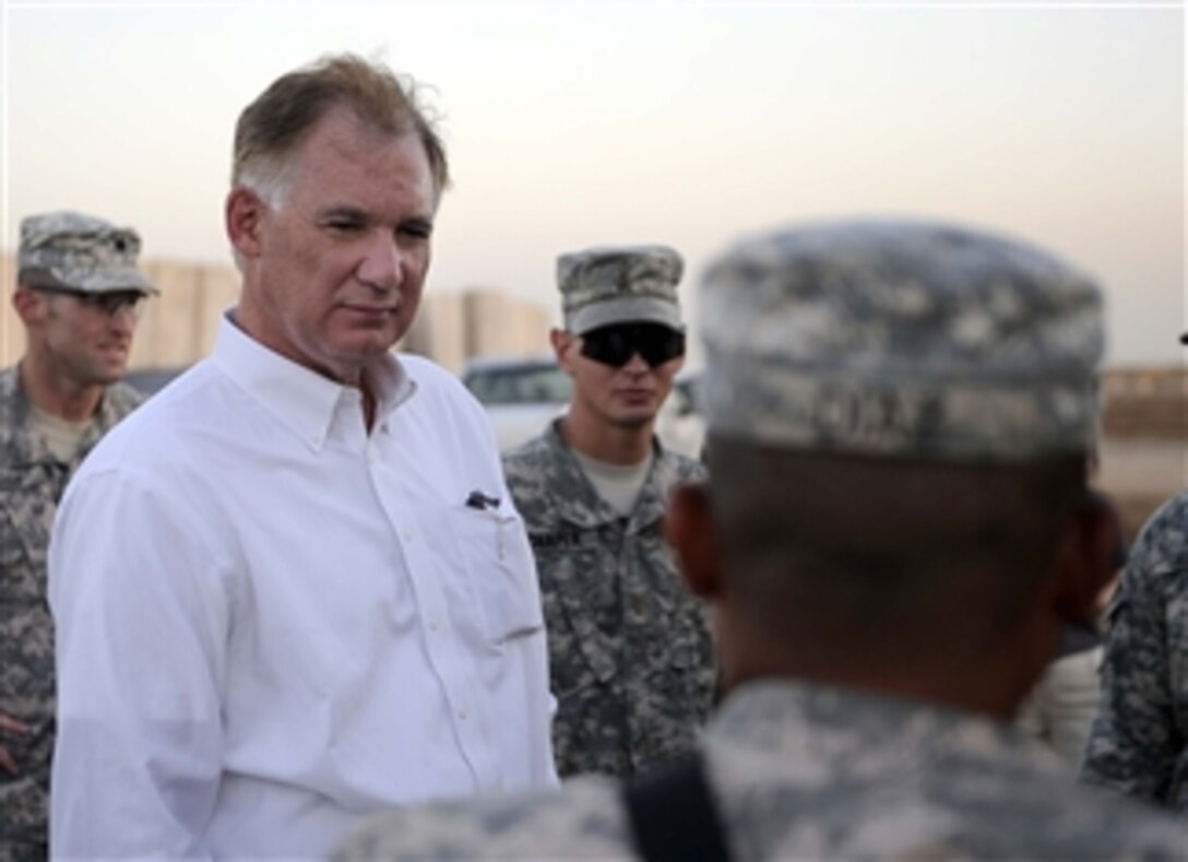 Deputy Secretary of Defense William J. Lynn III is given a brief by soldiers of the 172nd Infantry BrigadeÕs Route Clearance Teams at Field Operating Base Kalsu outside of Baghdad, Iraq, on Sept. 11, 2009.  