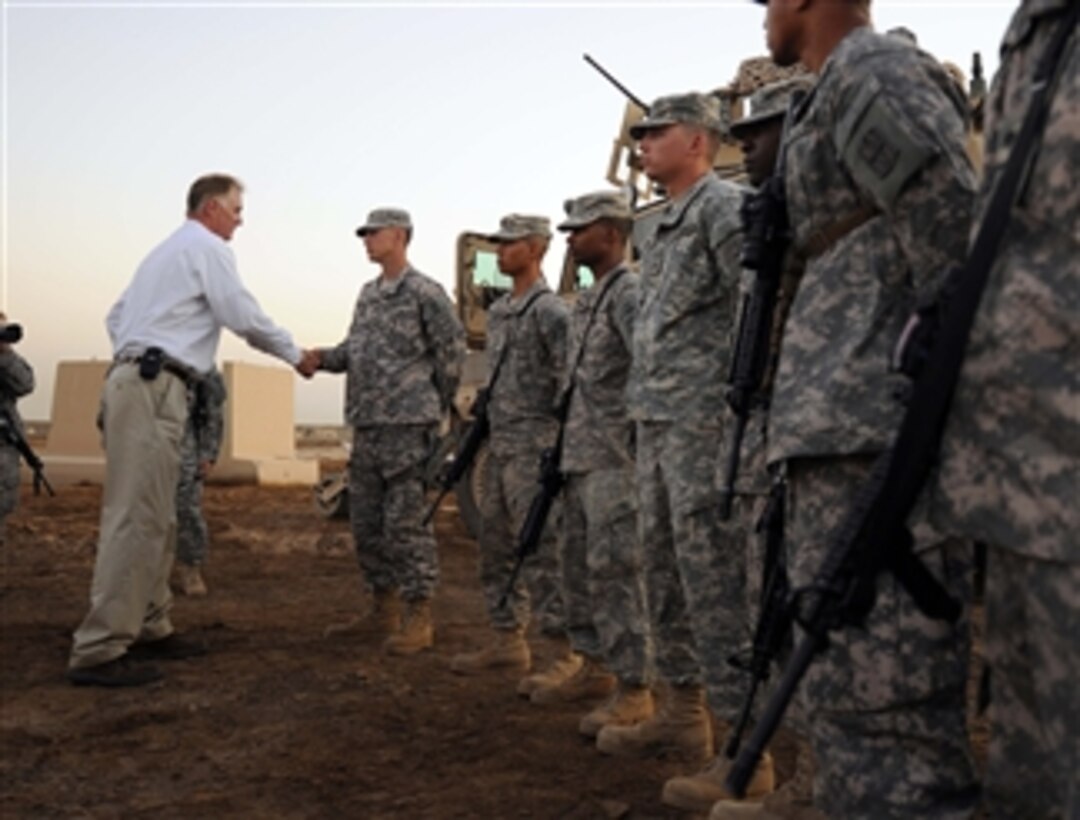 Deputy Secretary of Defense William J. Lynn III thanks soldiers of the 172nd Infantry Brigade's Route Clearance Teams for their outstanding service at Field Operating Base Kalsu outside of Baghdad, Iraq, on Sept. 11, 2009.  