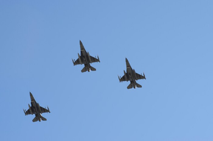 NELLIS AIR FORCE BASE, Nev.-- F-16 Fighting Falcons, assigned to the 57th Wing, perform the "Missing Man" flyby formation at the conclusion of the the Nellis 2009 National Prisoners of War/Missing in Action Recognition Day ceremony, here, Sept. 18. The ceremony is held annually for surviving veterans and those that never returned from combat. (U.S. Air Force photo by Lawrence Crespo)