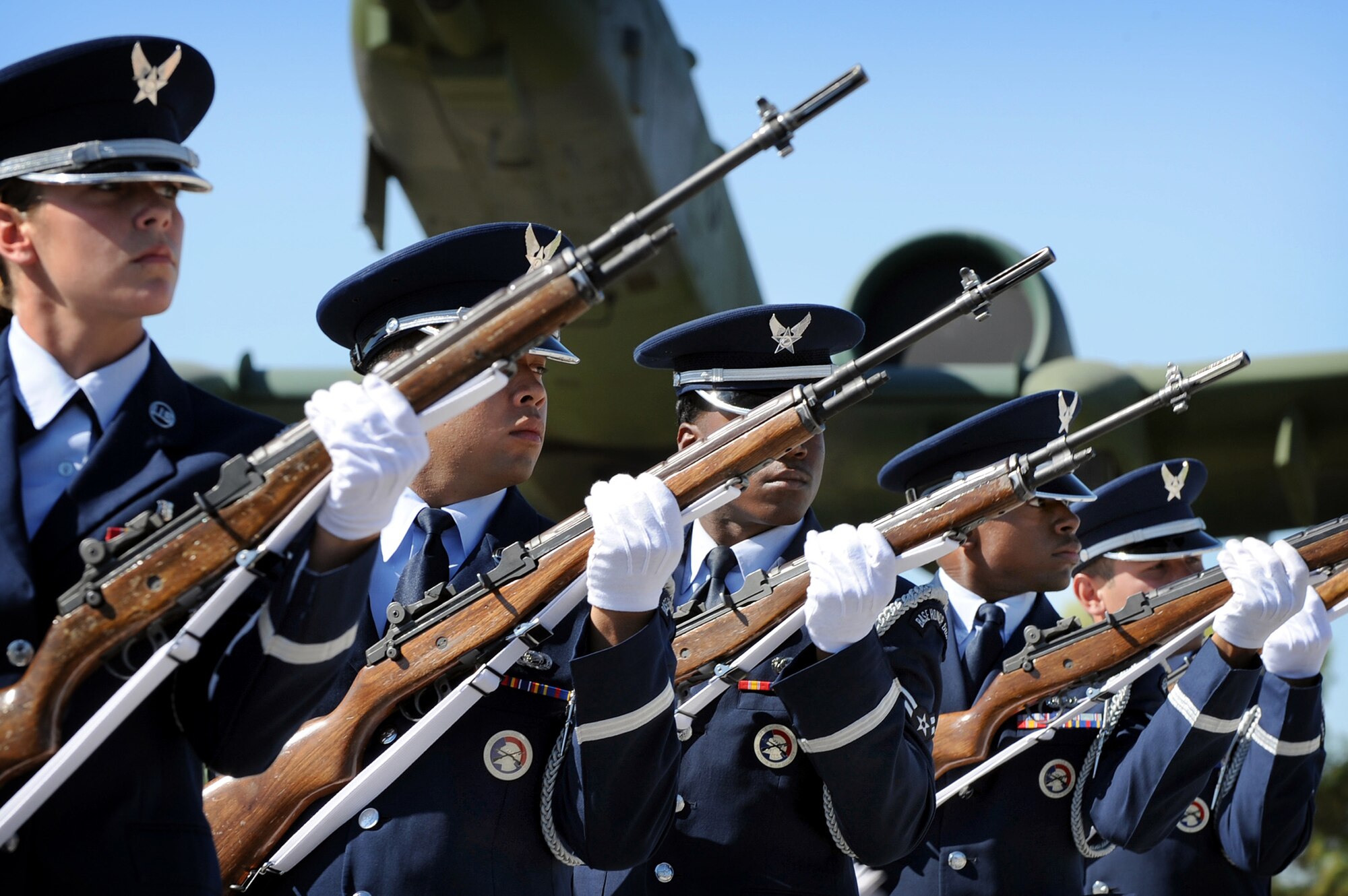 NELLIS AIR FORCE BASE, Nev. -- Nellis Air Force Base Honor Guardsmen perform a 21-gun salute during the Nellis 2009 National Prisoners of War/Missing in Action Recognition Day ceremony at Freedom Park, here, Sept. 18. During the ceremony veterans and members from the 7-11 Chapter of the American Ex-Prisoiners of War were the honorees. (U.S. Air Force photo by Lawrence Crespo)
