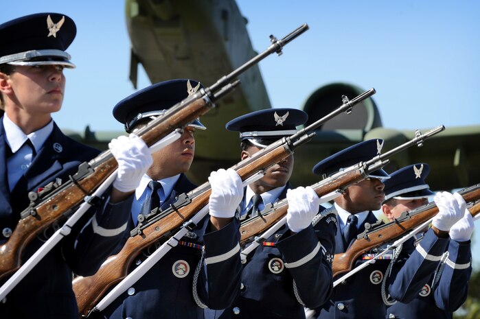 NELLIS AIR FORCE BASE, Nev. -- Nellis Air Force Base Honor Guardsmen perform a 21-gun salute during the Nellis 2009 National Prisoners of War/Missing in Action Recognition Day ceremony at Freedom Park, here, Sept. 18. During the ceremony veterans and members from the 7-11 Chapter of the American Ex-Prisoiners of War were the honorees. (U.S. Air Force photo by Lawrence Crespo)

