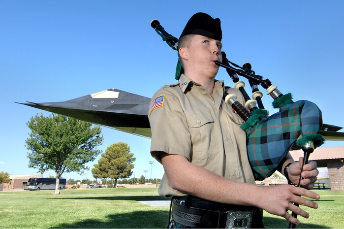NELLIS AIR FORCE BASE, Nev.-- Cadet 2nd Lt. William McLaughlin, a member of the Nevada Civil Air Patrol, plays "Amazing Grace" on the bagpipes during the Nellis 2009 National Prisoners of War/Missing in Action Recognition Day ceremony, here, Sept. 18. (U.S. Air Force photo by Lawrence Crespo)