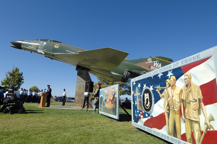 NELLIS AIR FORCE BASE, Nev.-- Brig. Gen. Kevin McLaughlin, United States Air Force Warfare Center vice commander, addresses the crowd during Nellis' 2009 National Prisoners of War/Missing in Action Recognition Day ceremony, here, Sept. 18. During the ceremony veterans and members from 7-11 Chapter of the American Ex-Prisoners of War were the honorees.(U.S. Air Force photo by Lawrence Crespo)