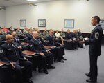 Chief Master Sgt. James Guertin, Air Force Personnel Center Command Career Enlisted Force Manager for Unmanned Aerial Systems Operators, gives the commencement speech at the inaugural Basic Sensor Operator Course graduation at Randolph Air Force Base, Texas, Sept. 18.  (U.S. Air Force photo/Rich McFadden) 