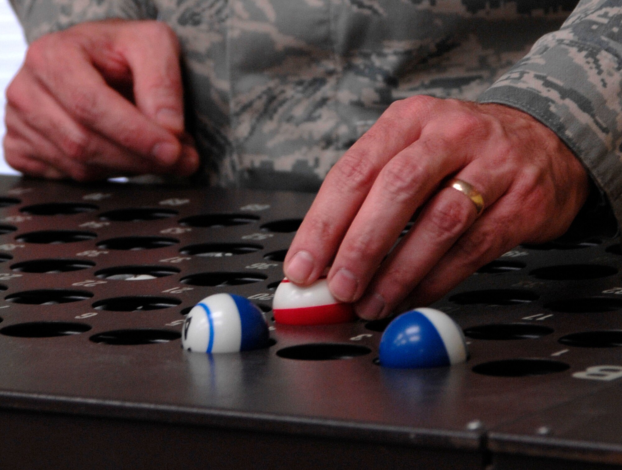 Master Sgt. Ronald Yarber, 22nd Air Refueling Wing Inspector General staff, leads a game of bingo, Sept. 17, 2009, at the Robert J. Dole Veterans Affairs Medical Center, Wichita, Kan. Past and present servicemembers get together for VA bingo quarterly. (U.S. Air Force photo/Senior Airman Laura Suttles)