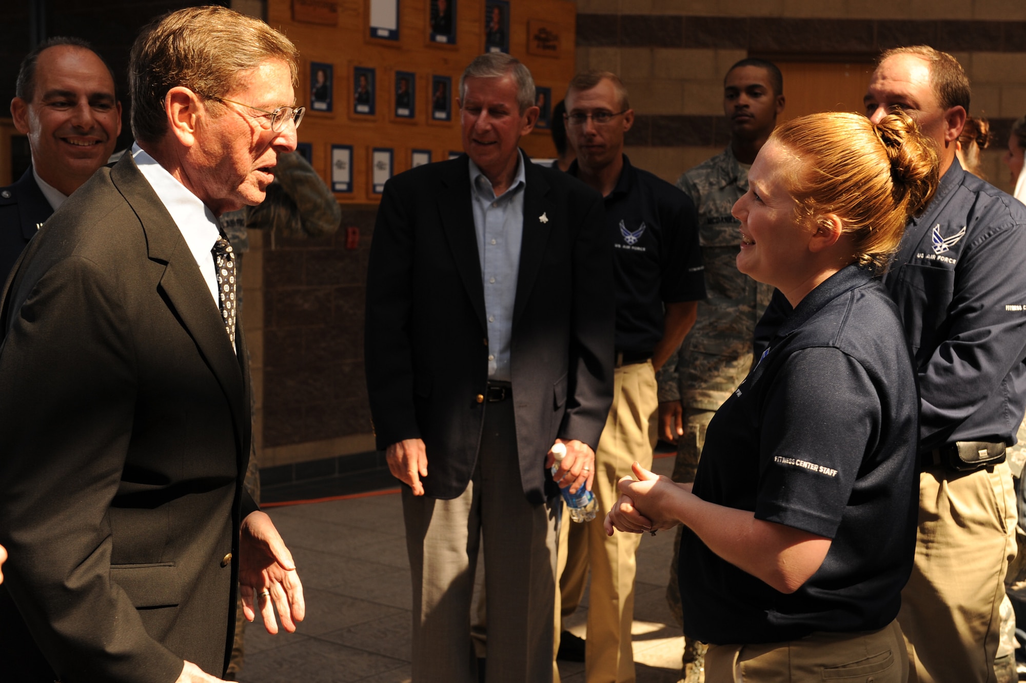 HOLLOMAN AIR FORCE BASE, N.M. -- Senator Pete Domenici receives a tour of the new Domenici Fitness and Sports Center from Staff Sgt. Christina Adams, 49th Force Support squadron after the official renaming of the Holloman Fitness and Sports Center here September 18. The Holloman Fitness and Sports Center officially opened in 2001 and provides Airmen from U.S. and German air forces, along with dependents and Department of Defense civilians with a wide range of individual and team athletic opportunities to include racquetball, squash and basketball.