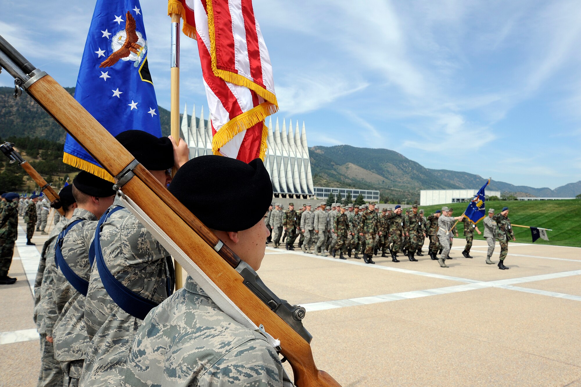 U.S. Air Force Academy Cadet Squadron 35 passes the Cadet Honor Guard during a parade at the Academy in Colorado Springs, Colo., celebrating the Air Force's 62nd birthday Sept. 18, 2009. (U.S. Air Force photo/Mike Kaplan)