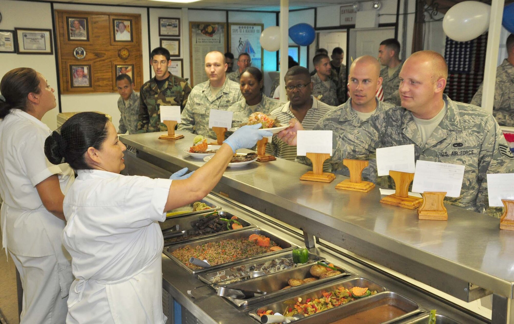 SOTO CANO AIR BASE, Honduras — Service members and civilians ate lobster and steak for lunch in the dining facility Sept. 18 for the Air Force’s 62nd birthday celebration. A short ceremony took place during the lunch hour where a brief presentation was given on Air Force history, and Senior Airman Angel Suarez, 612th Air Base Squadron, spoke about a recent deployment to Iraq (U.S. Air Force photo/Staff Sgt. Chad Thompson).