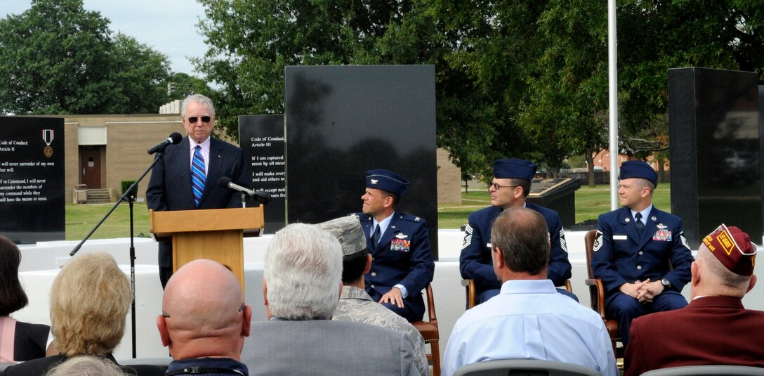 LANGLEY AIR FORCE BASE, Va. -- Retired Col. Frederick Crow, former prisoner of war, delivers a speech to Langley Airmen and other POWs during a dedication of the POWMissing-in-Action Memorial Sept. 18. Langley Airmen were able to meet with former POWs from World War II, the Korean War and Vietnam War. (U.S. Air Force photo/Senior Airman Dana Hill)