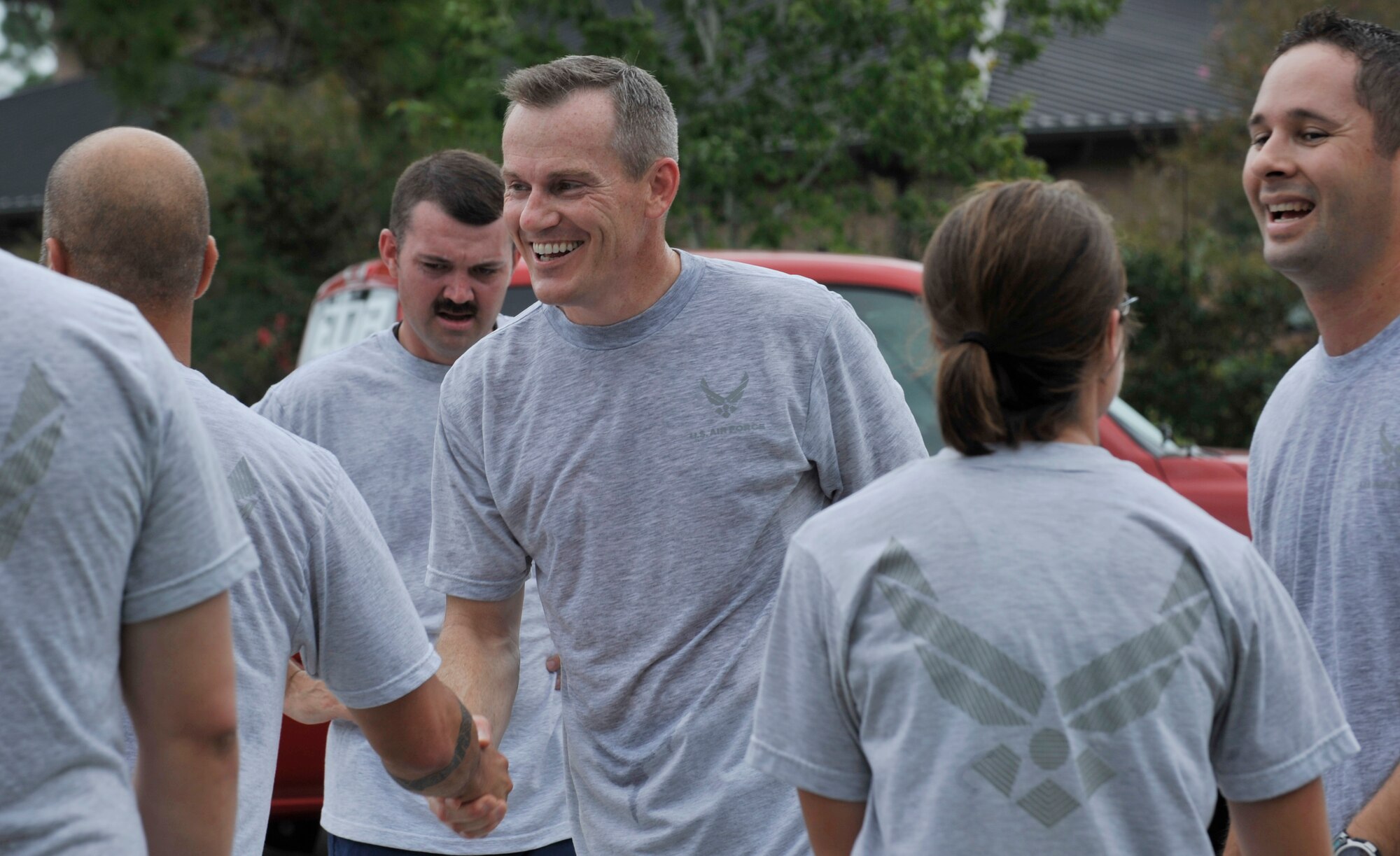 MOODY AIR FORCE BASE, Ga. -- Members of the 23rd Wing congratulate on another after participating in the 23-mile Tiger-thon run here Sept. 18. Individuals from various organizations on base joined together to run in the event. (U.S. Air Force photo by Senior Airman Schelli Jones)