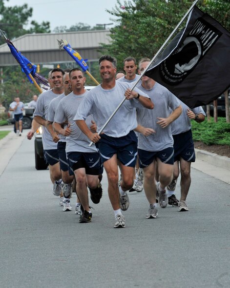 MOODY AIR FORCE BASE, Ga -- Col. William DeMaso, 23rd Wing vice commander, leads the group in the last mile of the 23-mile Tiger-thon run here Sept. 18. The event traveled throughout Valdosta, Ga., and is scheduled to end at Moody. (U.S. Air Force photo by Senior Airman Schelli Jones)
