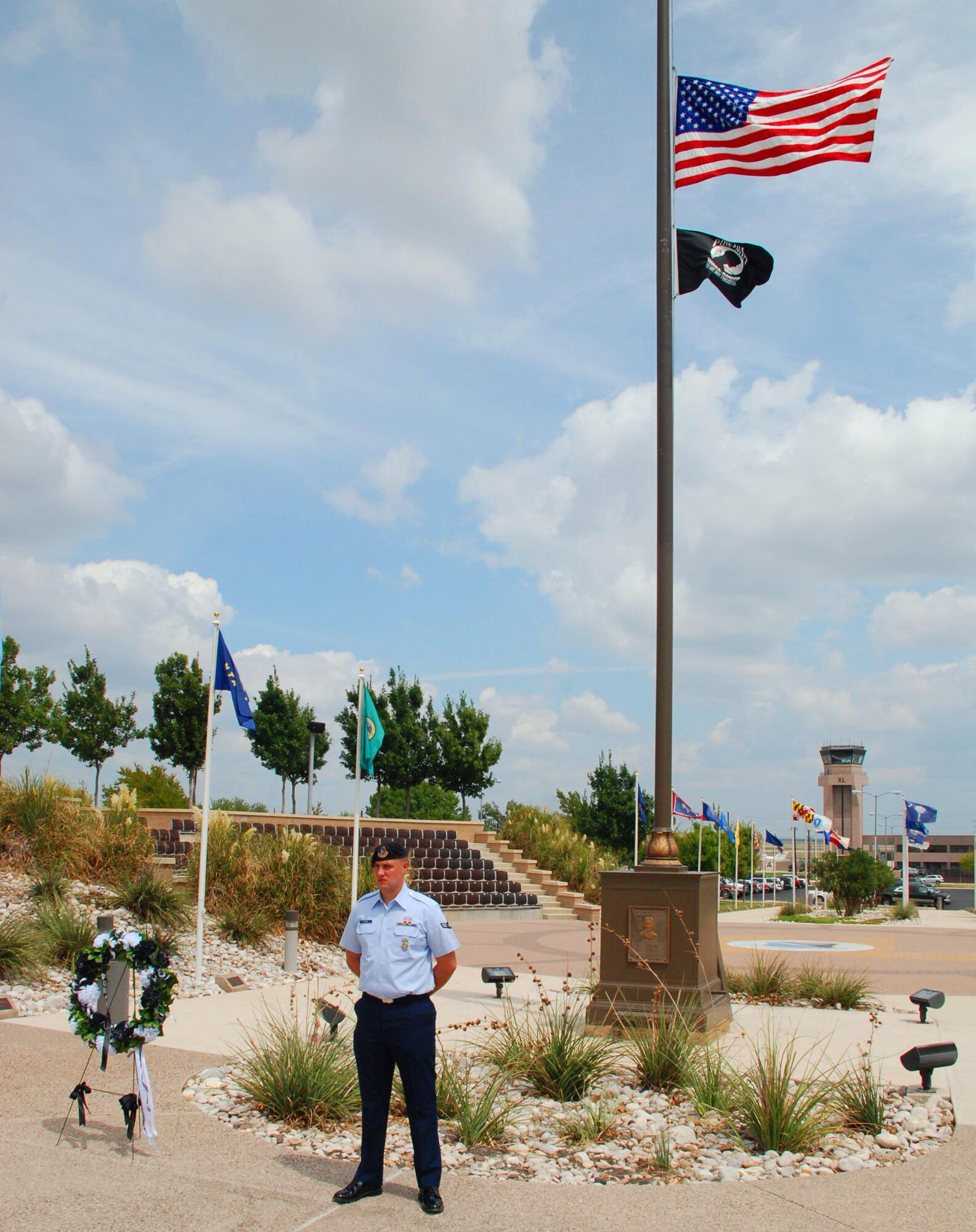 LAUGHLIN AIR FORCE BASE, Texas -- Airman 1st Class Glen Meyer, 47th Security Forces Squadron, stands guard at the base of Laughlin's flag pole in Heritage Park  as part of National POW/MIA Recognition Day here Sept. 18. Airman Meyer was one of many Airmen to stand guard in thirty-minute shifts that started at 5 a.m. and lasted until Laughlin’s POW/MIA remembrance ceremony at 5 p.m. later that day. (U.S. Air Force photo by Airman 1st Class Blake Mize)