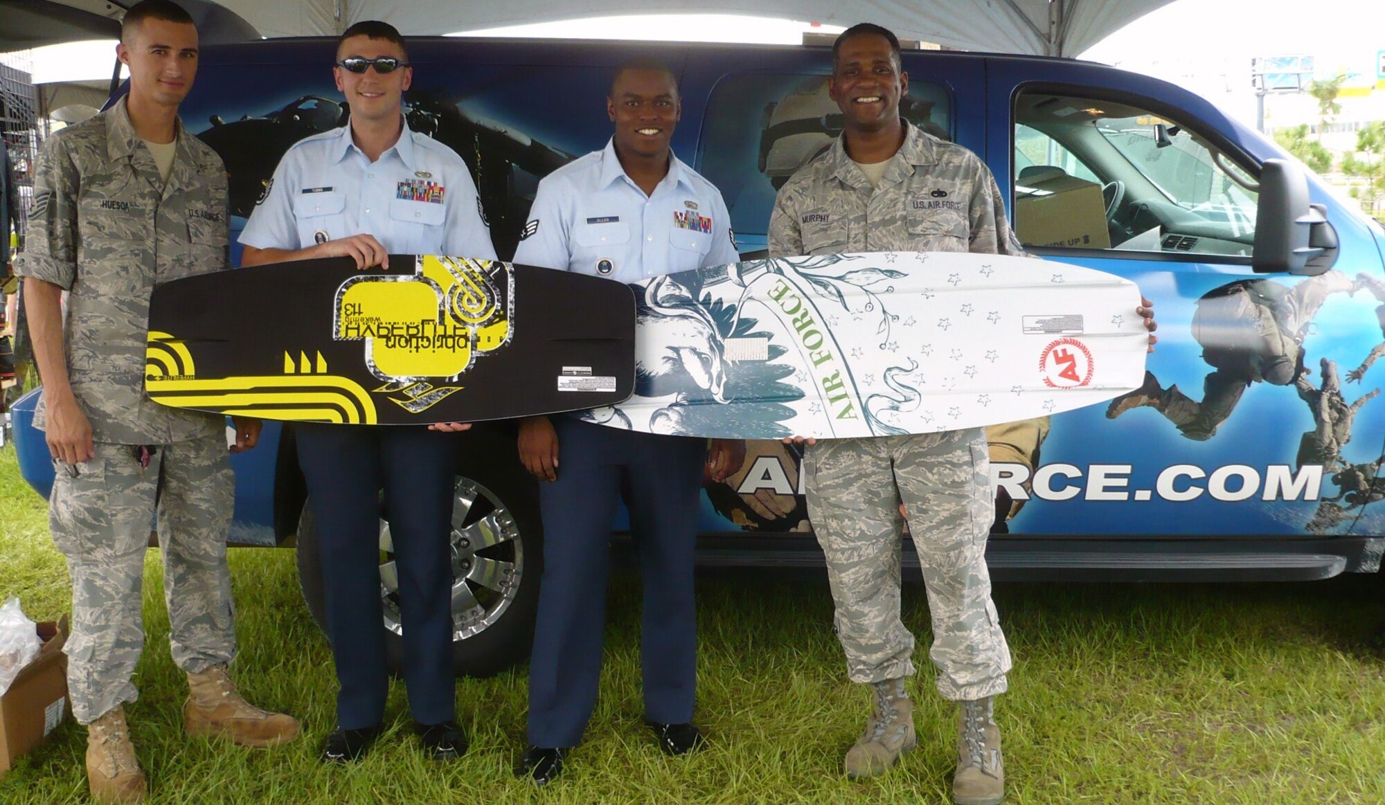(From left to right) Staff Sgt. Michael Huesca, Staff Sgt. Maxswell Tubbs, Senior Airman Brandon Allen and Master Sgt. Sean Murphy, 333rd Recruiting Squadron recruiters, at the 2009 King of Wake series in Orlando, Fla. The King of Wake series is one of the world’s elite pro wakeboarding circuits and attracted more than 500 spectators.  333rd RCS recruiters collected more than 30 qualified leads for the Air Force at this event. “This is an excellent opportunity to recruit the hard-to-fill position’s the Air Force is looking for,” Sergeant Murphy said. The Air Force engages in event marketing and sponsorship to raise public awareness about America’s Air Force and to help the Air Force Recruiting Service meet its mission of recruiting quality men and women for America’s Air Force. (U.S. Air Force photo/Staff Sgt. Jeffrey Storman)