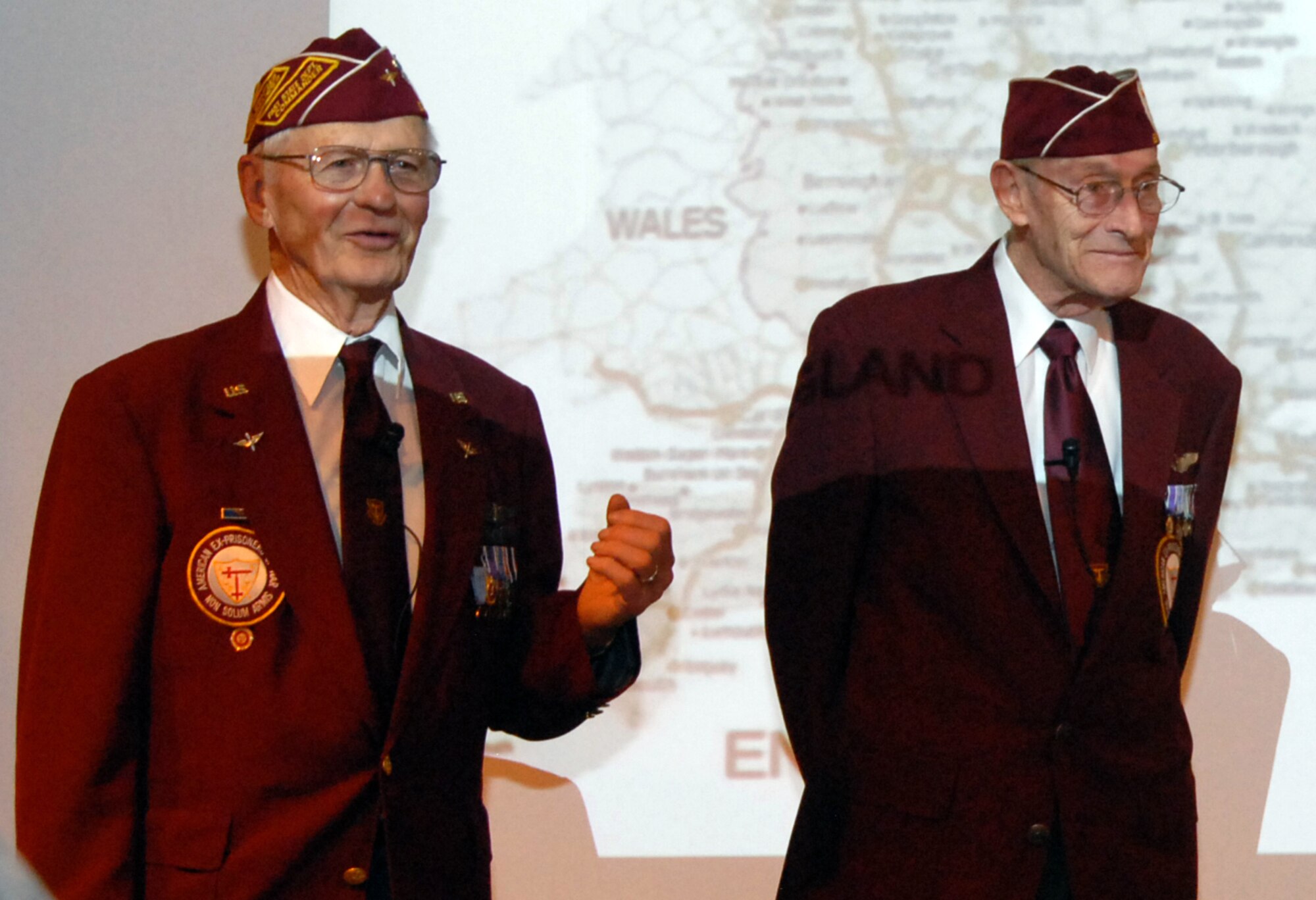 Former 1st Lts. Robert Ball and Clayton Nattier speak at the Air Reserve Personnel Center's Warrior Day on Sept. 17. Mr. Ball and Mr. Nattier are former prisoners of war and served with the U.S. Army Air Corps during World War II. The Warrior Day presentation was held in conjunction with the opening ceremony of the Center's POW/MIA Commemoration Day Vigil. (U.S. Air Force photo/Ellen Edwards)