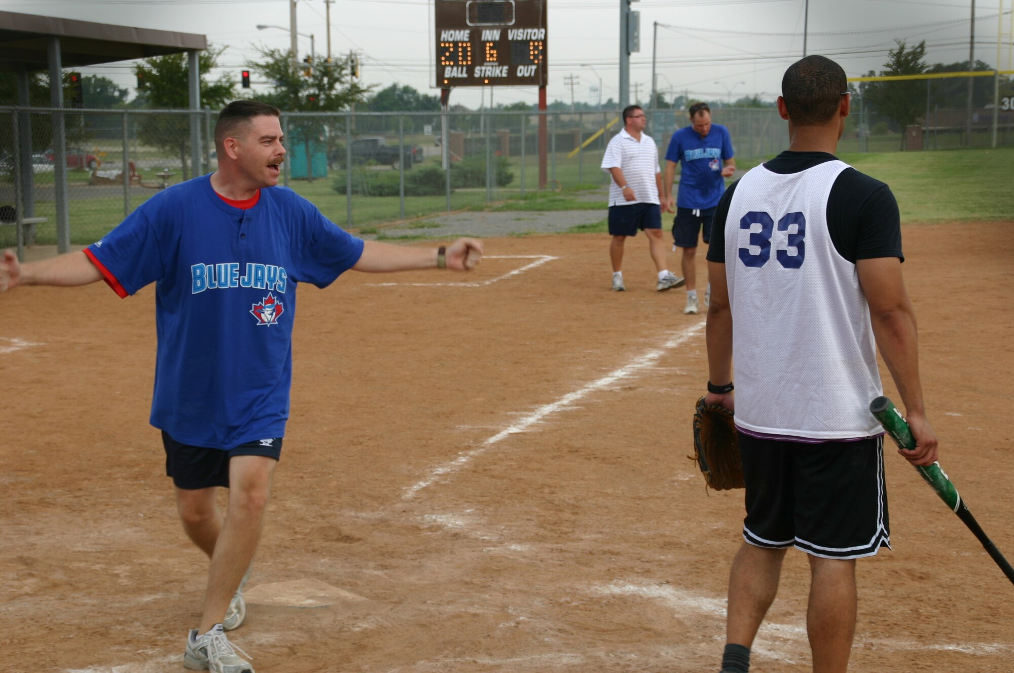 The Canadian and American components of the 552nd Air Control Wing played a friendly game of Softball 9 September in honor of the 30th anniversary of Canadian-American partnership. Despite the fierce competition, the American team won, 27 to 8. Photo courtesy of Mr. Kenneth LaFayette.