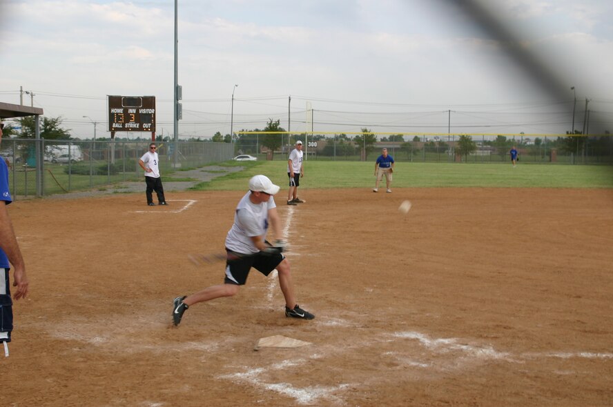 The Canadian and American components of the 552nd Air Control Wing played a friendly game of Softball 9 September in honor of the 30th anniversary of Canadian-American partnership. Despite the fierce competition, the American team won, 27 to 8. Photo courtesy of Mr. Kenneth LaFayette.