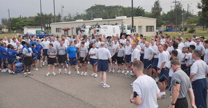 SOTO CANO AIR BASE, Honduras — Chief Master Sgt. Walter Deason, 612th Air Base Squadron senior enlisted advisor, speaks to the runners of the Air Force's 62nd  birthday celebration 5k run near the base operations building here Sept. 18.  About 175 Soldiers, Sailors and Airmen participated in the 5k run around the base runway (U.S. Air Force photo/Staff Sgt. Chad Thompson).