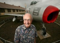 Retired Lt. Col. Russell Reed stands in front of an F-86A outside Lackland's History and Traditions Museum Sept. 11. The F-86A is one of several planes he flew during his Air Force career. (U.S. Air Force photo/Robbin Cresswell)
