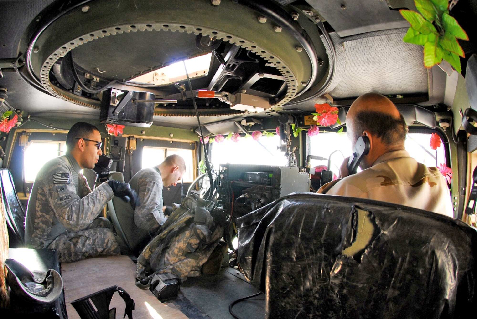 Maj. Lee Dewald drives a Humvee during a training exercise between Iraqi army and air force units at Camp Wessam, Iraq, Sept. 12, 2009. Major Dewald is an air liaison officer with the 84th Expeditionary Air Support Operation Squadron. (U.S. Army photo/Spc. Darryl L. Montgomery)