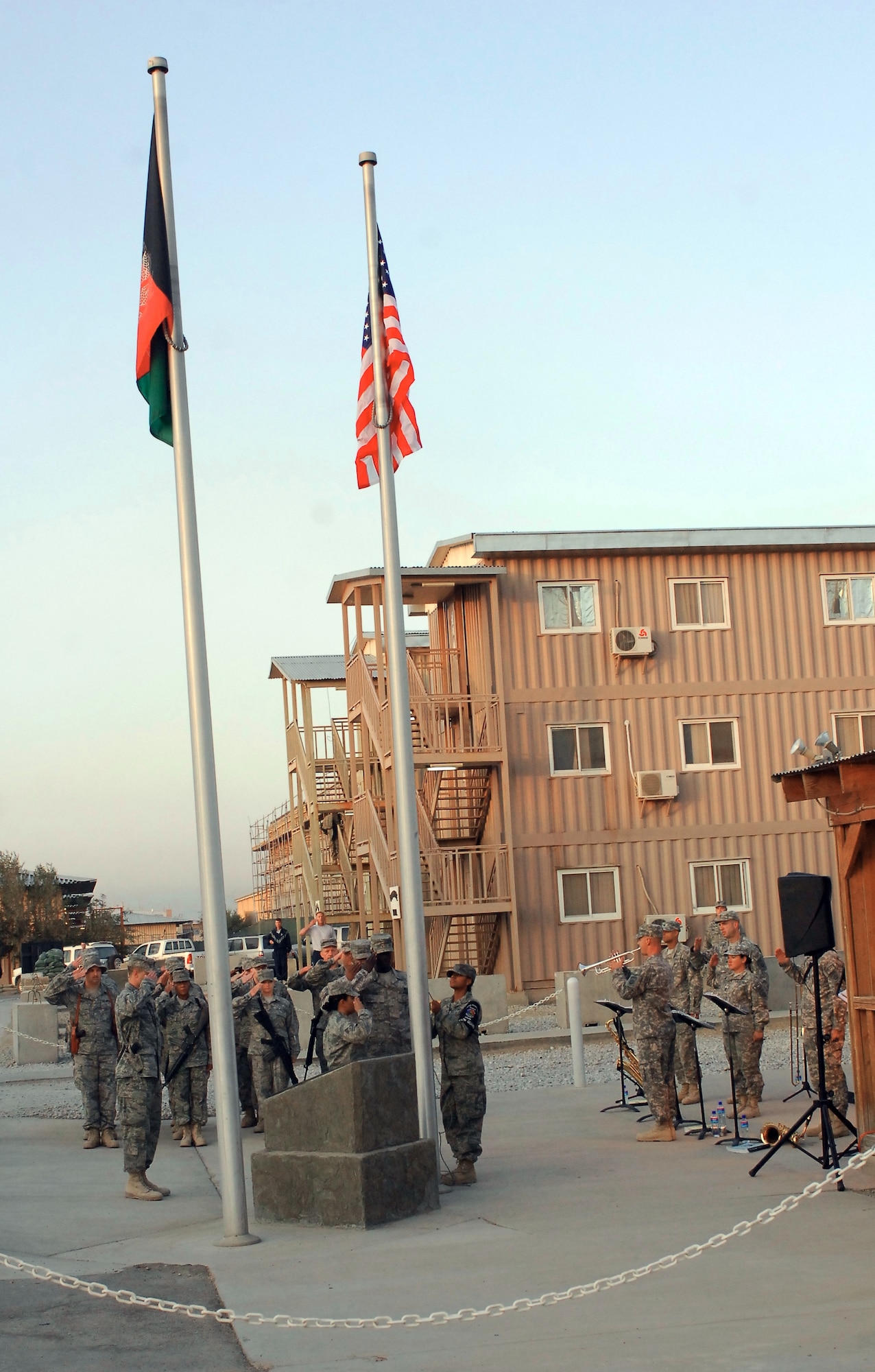 The Bagram Airfield honor guard team raises the American flag on the 62nd Air Force birthday Sept. 18, 2009, at Camp Cunningham, Afghanistan. The camp is named after pararescueman Senior Airman Jason D. Cunningham, who gave his life in Afghanistan in March 2002 saving 10 lives and making it possible for seven others who were killed to come home. (U.S. Air Force photo/Senior Airman Felicia Juenke) 