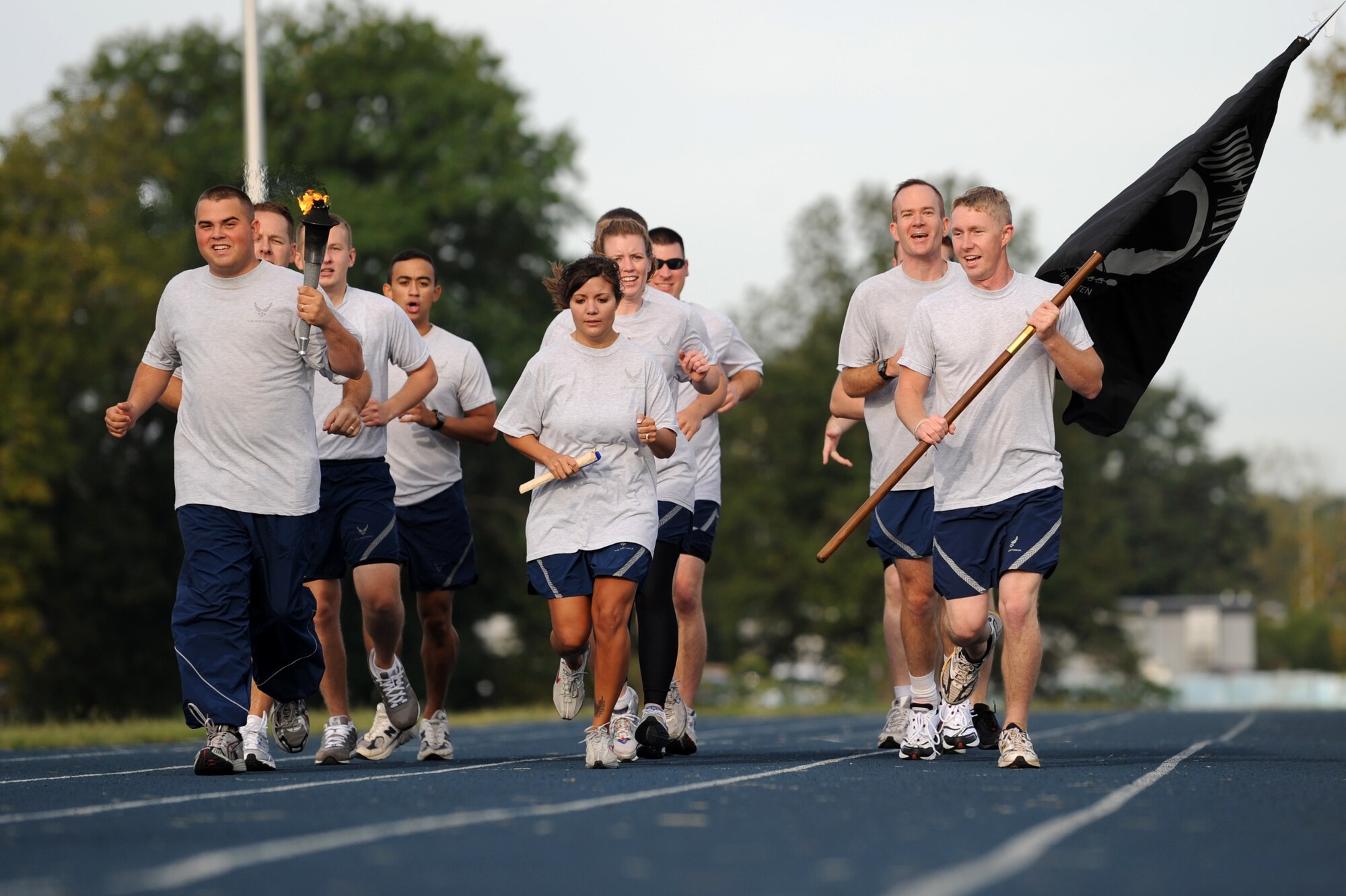 WHITEMAN AIR FORCE BASE, Mo. – Members of the 509th Communications Squadron runs their portion of the POW/MIA run, Sept. 18. The POW/MIA run is a 24-hour torch run to honor prisoners of war and missing-in-action personnel (U.S. Air Force photo/Senior Airman Cory Todd)