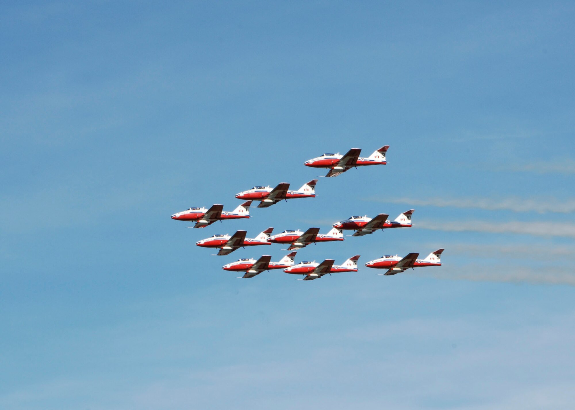 SCOTT AIR FORCE BASE, Ill. -- The Canadian air forces Snowbirds make their appearance at Scott after leaving Quebec, Canada, yesterday. The Snowbirds will be the main act at the Airpower Over the Midwest Airshow tomorrow and Sunday at Scott from 9 a.m. to 5 p.m.

(U.S. Air Force photo/Airman 1st Class Tristin English)