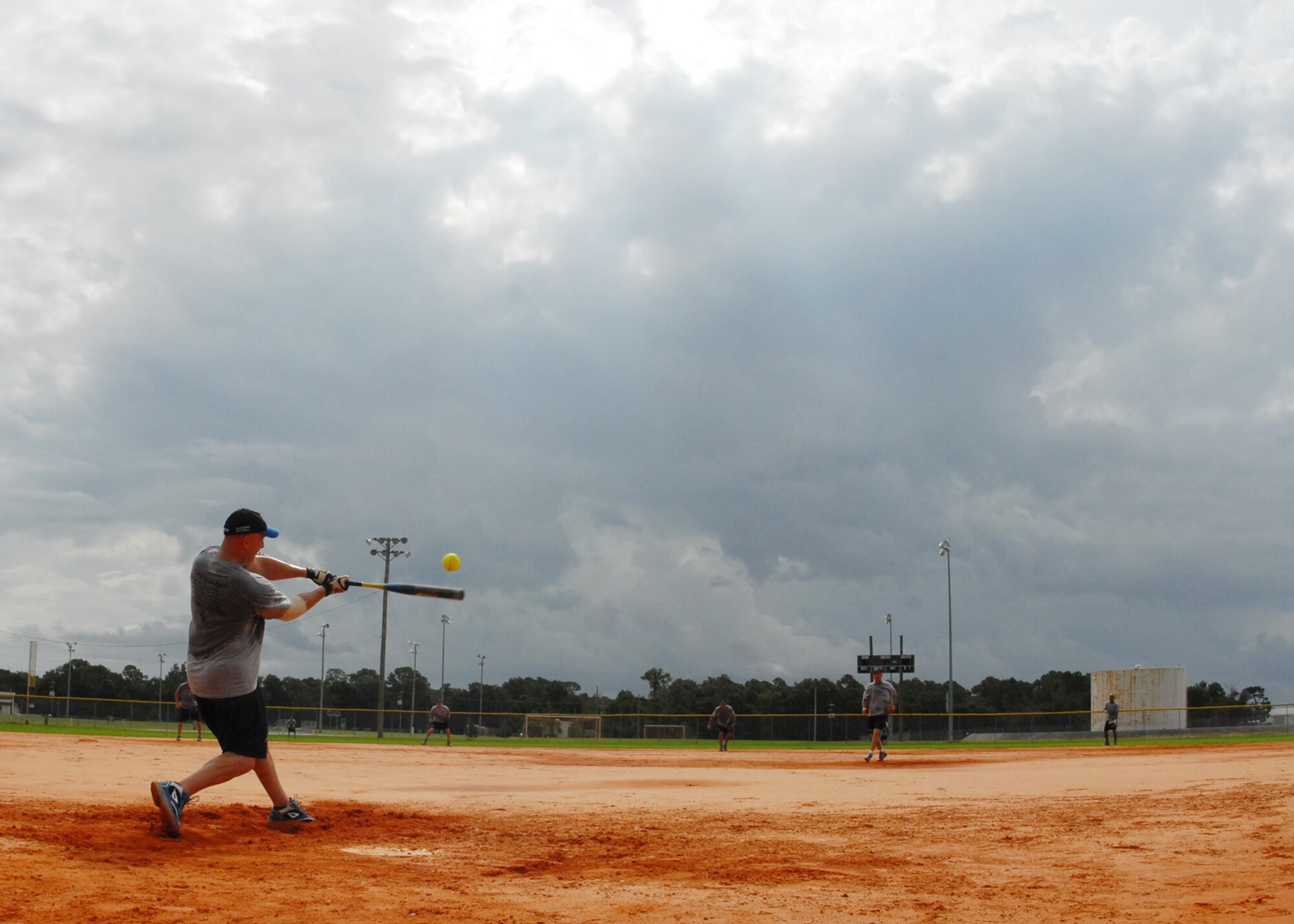 Master Sgt. Daniel Simpson swings away during an Air Force Softball Team practice session Sept. 16 at Eglin Air Force Base.  Eglin is the site for tryouts and practices leading up to the All Services Tournament held in Pensacola, Fla., beginning Sept. 20.  Fifteen Air Force members from 11 different bases made the team this year.  Four ‘rookies’ made the team this year along with 11 team veterans.  (U.S. Air Force photo/Samuel King Jr.)