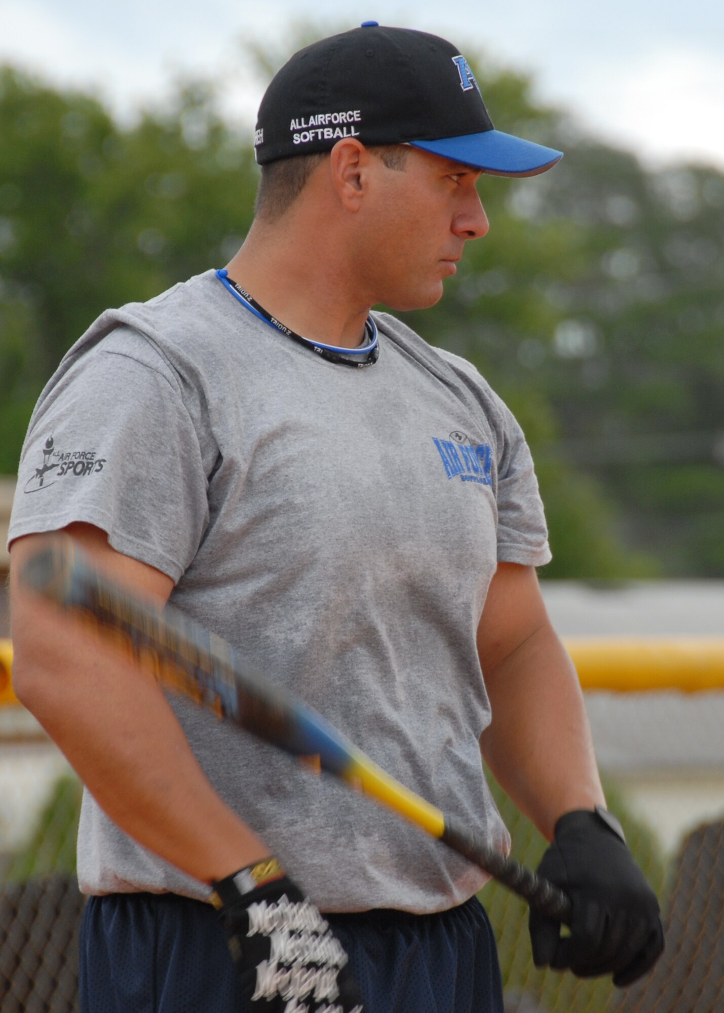 Capt. William Mamourieh surveys the field before digging in to hit during an Air Force Softball Team practice session Sept. 16 at Eglin Air Force Base.  Eglin is the site for tryouts and practices leading up to the All Services Tournament held in Pensacola, Fla., beginning Sept. 20.  Fifteen Air Force members from 11 different bases made the team this year.  Four ‘rookies’ made the team this year along with 11 team veterans.  (U.S. Air Force photo/Samuel King Jr.)