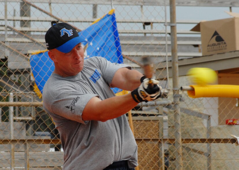 Master Sgt. Daniel Simpson swings away during an Air Force Softball Team practice session Sept. 16 at Eglin Air Force Base.  Eglin is the site for tryouts and practices leading up to the All Services Tournament held in Pensacola, Fla., beginning Sept. 20.  Fifteen Air Force members from 11 different bases made the team this year.  Four ‘rookies’ made the team this year along with 11 team veterans.  (U.S. Air Force photo/Samuel King Jr.)