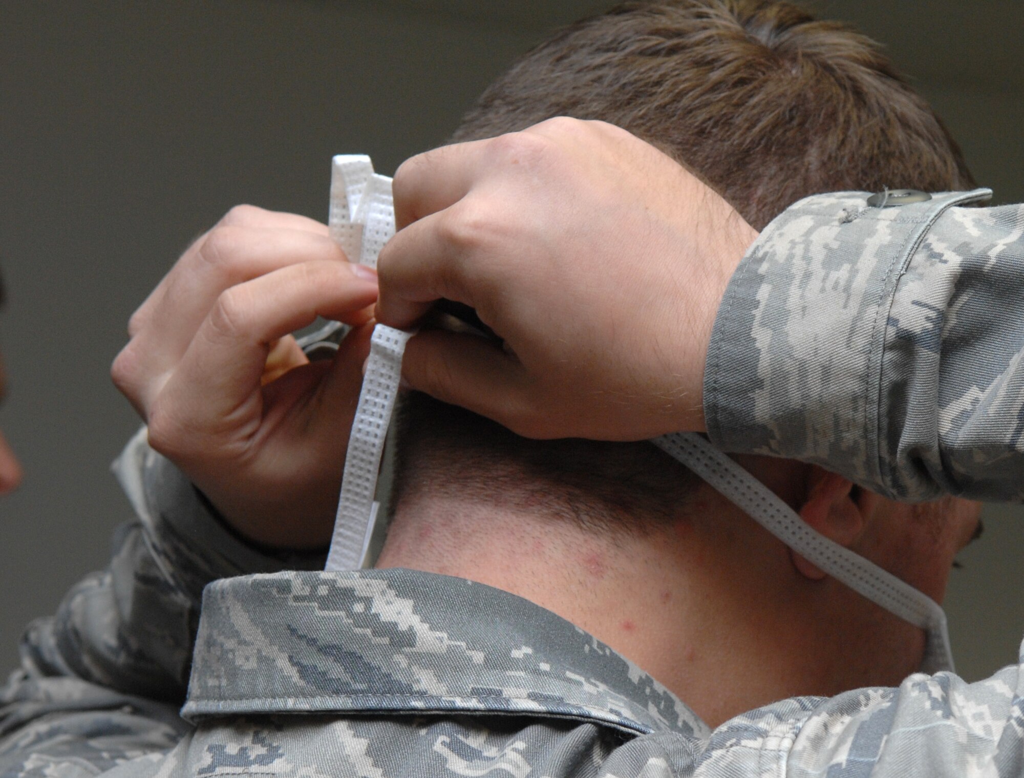 SPANGDAHLEM AIR BASE, Germany – Staff. Sgt. TaShanna Price, 52nd Dental Squadron, performs triage on a patient during a Disease Containment Plan Sept 17. The exercise tested the base’s ability to perform mass prophylaxis which are procedures intended to prevent the spread of disease. The 52nd Medical Group planned and executed situational briefings, triage, medication dispensing and documentation for 232 patients. (U.S. Air Force photo/Airman 1st Class Staci Miller)