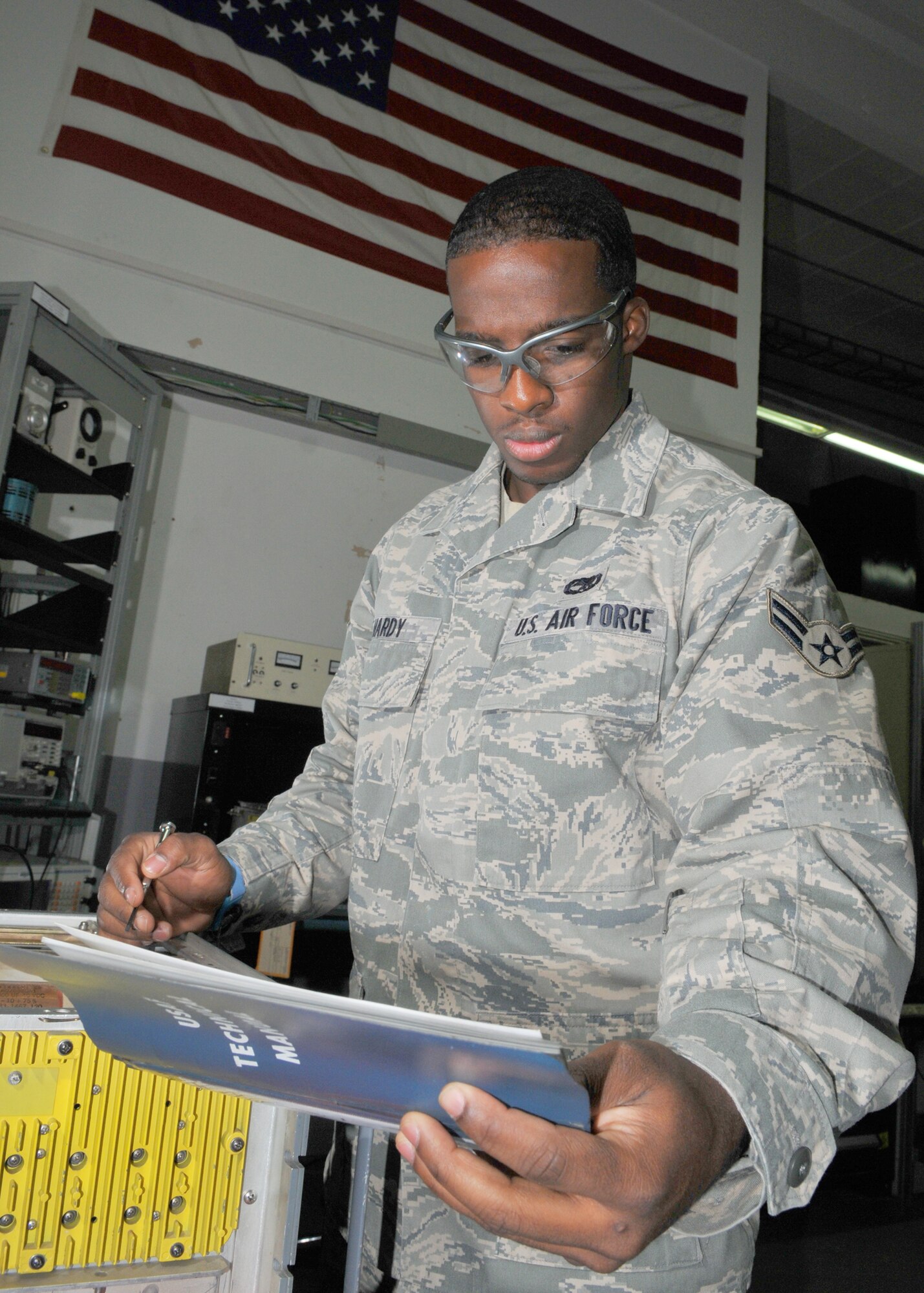 SPANGDAHLEM AIR BASE, Germany -- Airman 1st Class Maurice Hardy, 52nd Communications Squadron, troubleshoots a GRC-171 radio transmitter due to a low power output at the radio frequency transmission systems area near the munitions storage area here Sept. 18. Whenever a preventative maintenance inspection is due radio technicians to troubleshoot and correct any inaccurate readings. (U.S. Air Force photo by Airman 1st Class Nick Wilson)